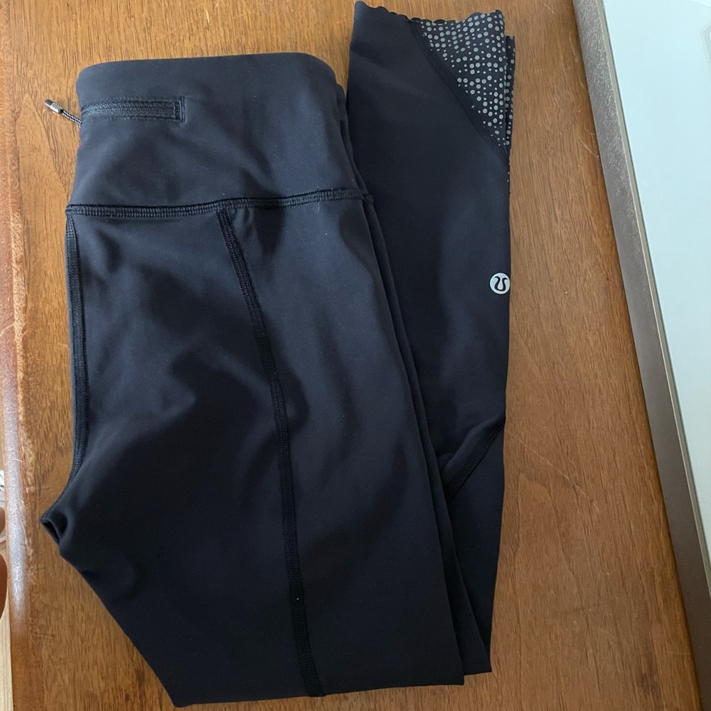 Lululemon tuff stuff reflective dot cropped size 4